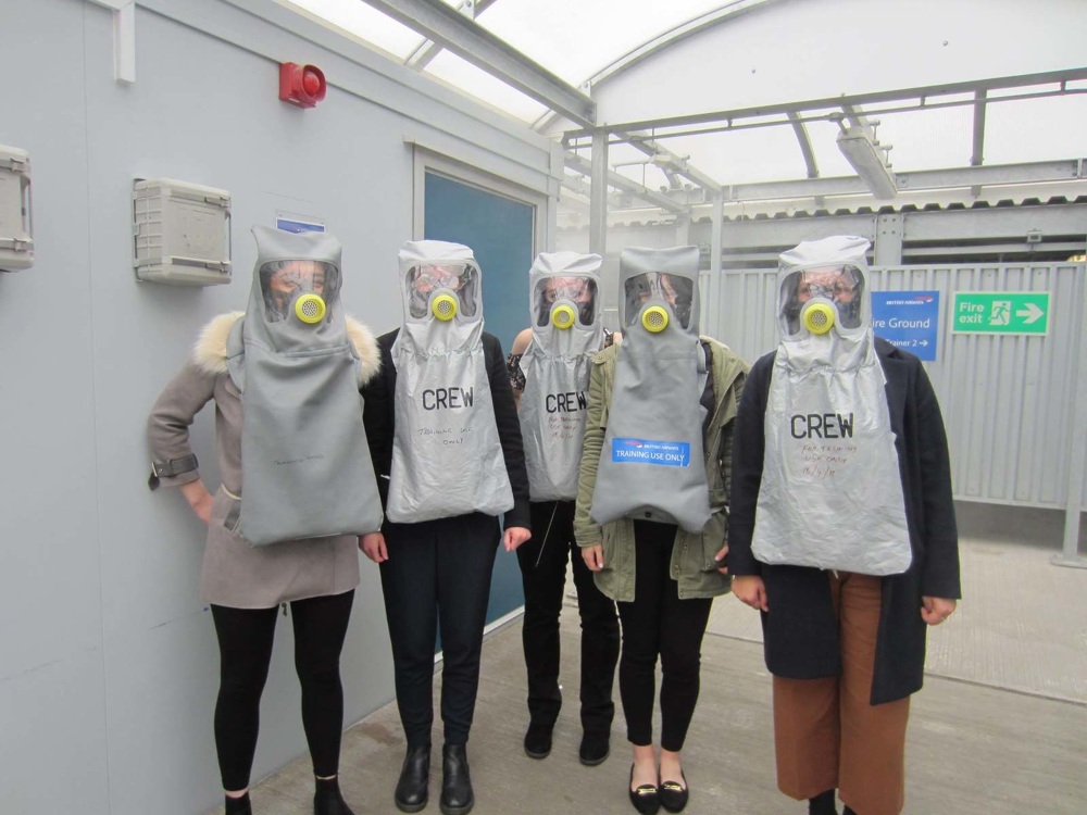 The artists performing the air-hostess archetype as part of the research.