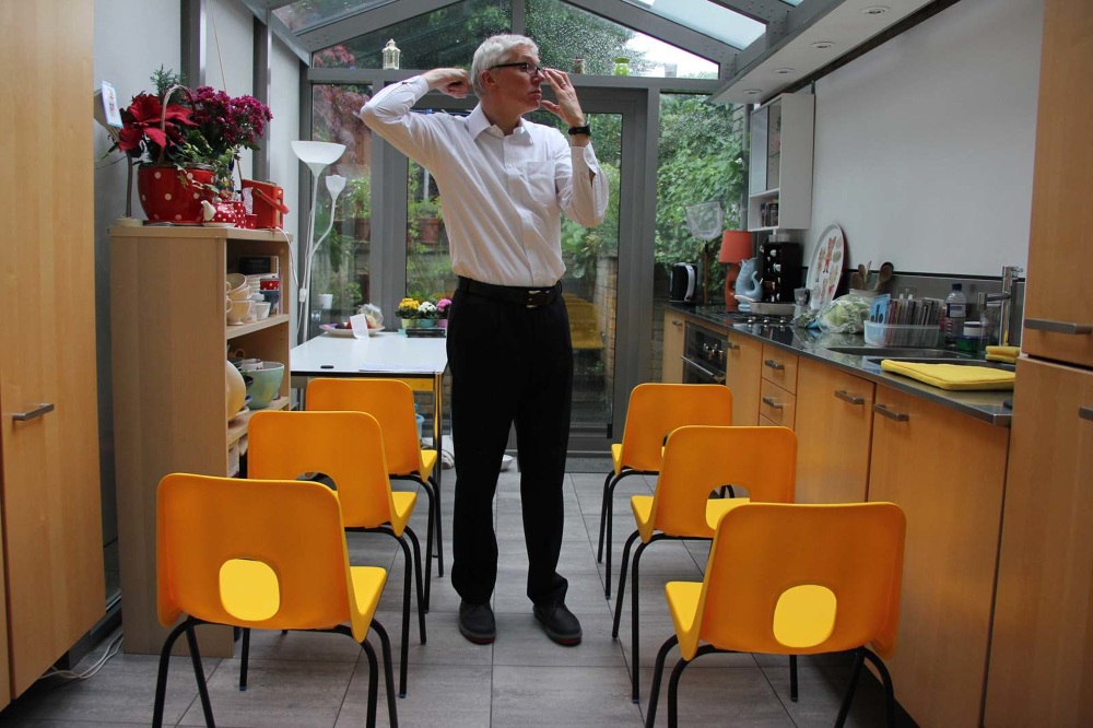 Performance documentation exploring scripted gendered labour in domestic and work spheres.